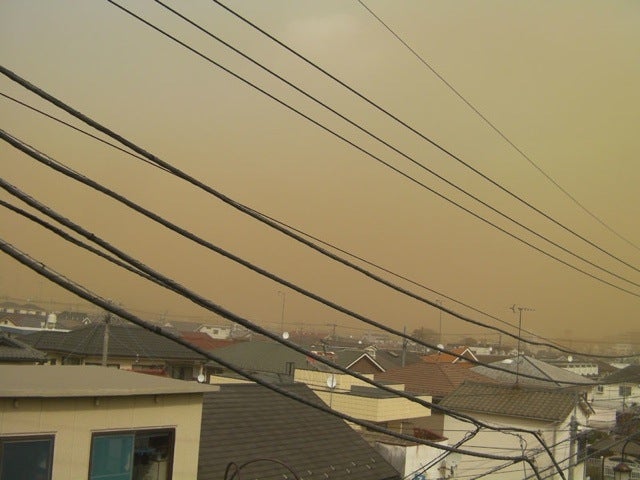 Sand, Smog, or Something Covered Japan in a Yellow Haze