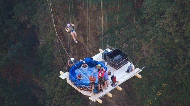 Crazy Swiss Swingers Suspend Hot Tub from Bridge