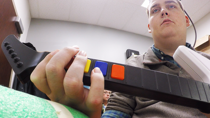 Brain Implant Enables Quadriplegic Man to Play Guitar Hero With His Hands