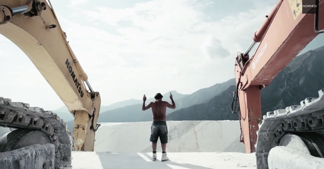 Watch a Man Direct Marble Quarry Excavators With Subtle Hand Gestures