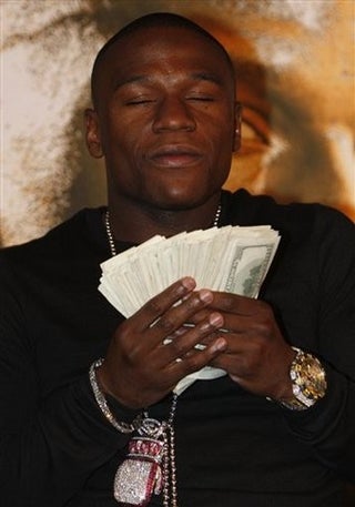 Mayweather Jr. Makes It Rain With Monopoly Money, Loses Street Cred