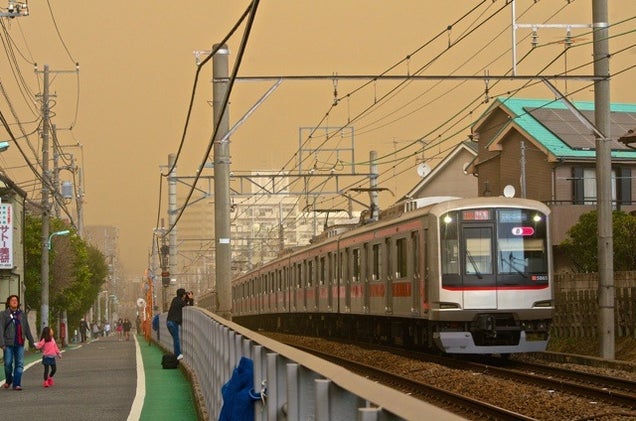 Sand, Smog, or Something Covered Japan in a Yellow Haze