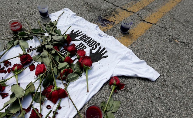 Report: Police Drove Over Michael Brown Memorial, Let Dog Piss on It