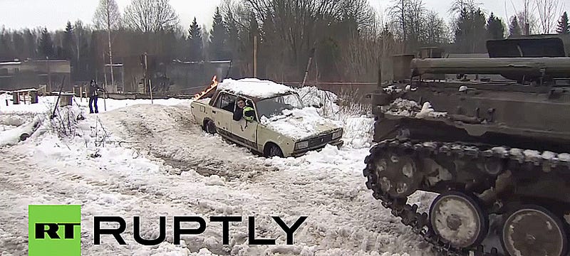 Russian Infantry Fighting Vehicle Tows Snowboarders Through Shooting Range