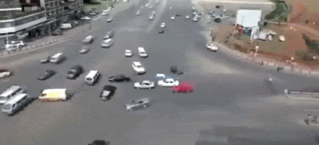 This busy street intersection with no traffic lights is just pure chaos