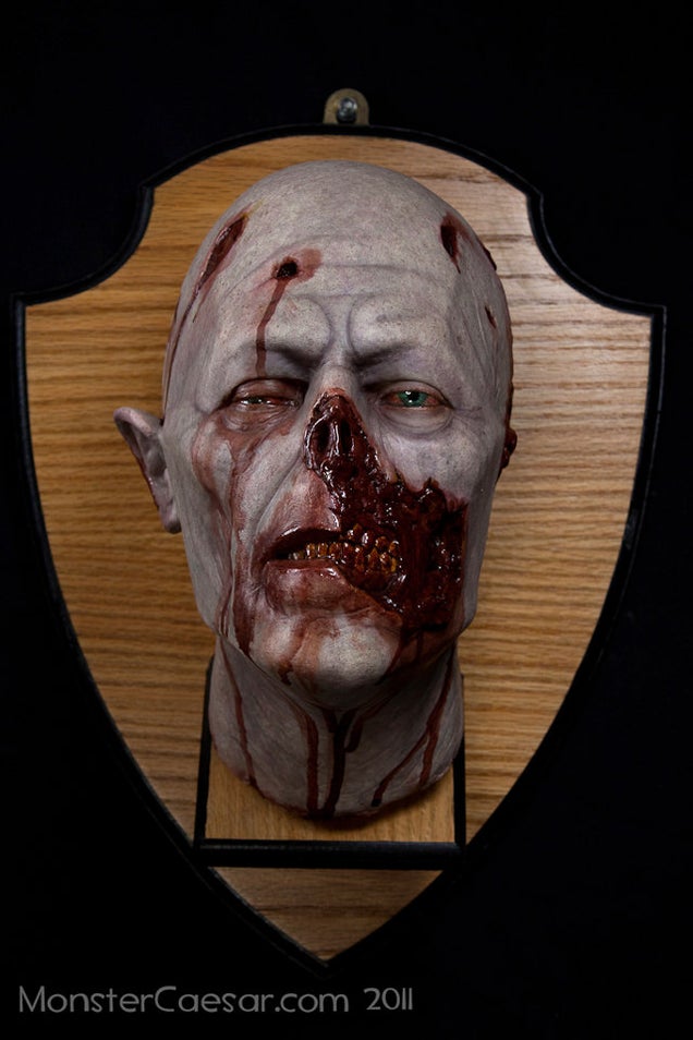 Mounted zombie head shows that you are a decorator of undead distinction