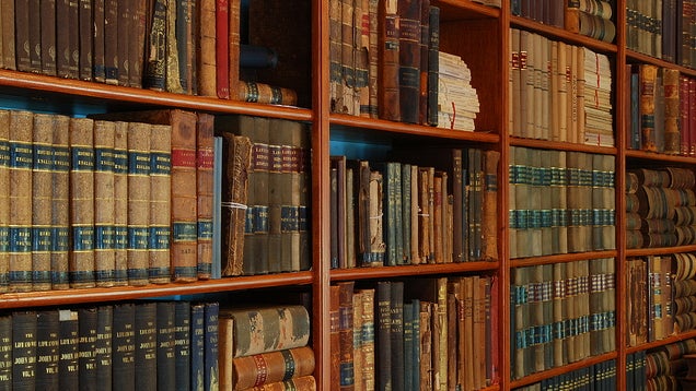 Use Sealed Wood or Metal Bookshelves to Protect Your Book Collection