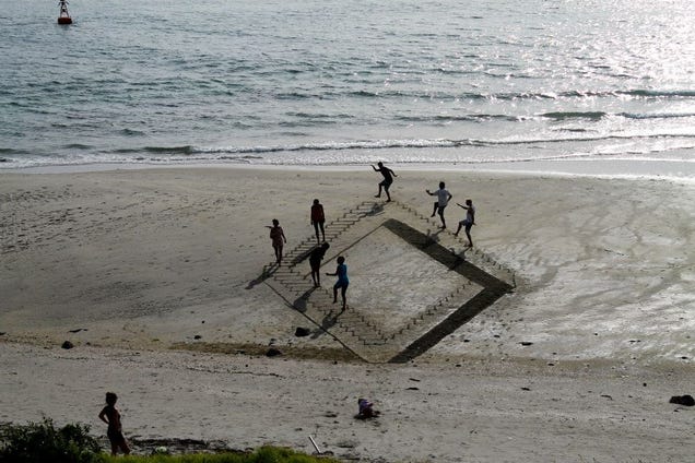 These 3D sand drawings create fun trippy illusions on the beach