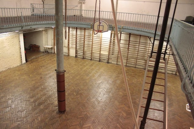 The world's oldest basketball court has iron poles in the middle of it