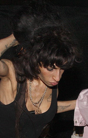 Amy Winehouse Gives Back Gowns With Sick Surprise