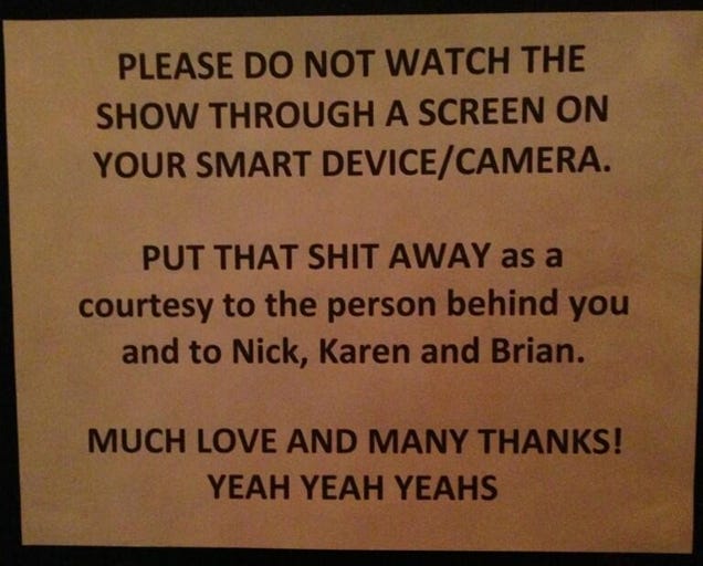Yeah Yeah Yeahs Post Sadly Necessary Sign Asking Fans Not to Watch Their Show Through a Smartphone Screen