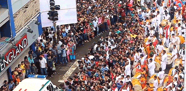 Watch a Huge Crowd of People Miraculously Make Way for an Ambulance to Get Through