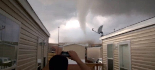 Mad guys joke as a tornado comes to destroy them