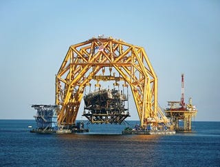 America's Biggest Claw Game Plucks Oil Rigs from the Briny Deep