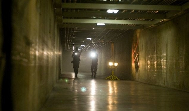 Your first look at the "monsters versus security guards" flick Cost of Living
