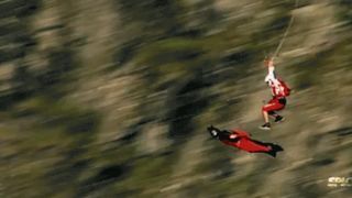 Mad man uses insane wingsuit jumper as his personal flying carpet