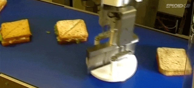 Magic ultrasonic cutting machine perfectly slices sandwiches in half