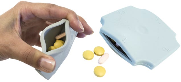 Leave the Bottles At Home With This Silicone Pocket Pill Holder
