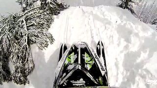 These snowmobile vertical drops look like a suicidal snow rollercoaster