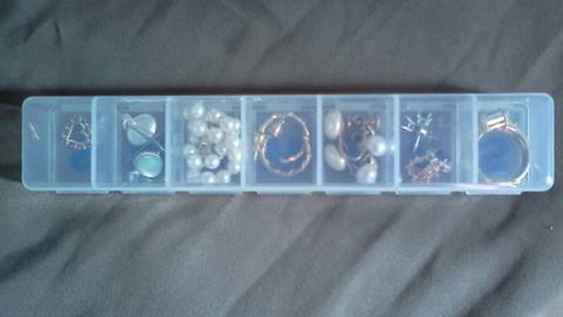 Use a Pill Box to Organize Jewelry and Small Items While Traveling