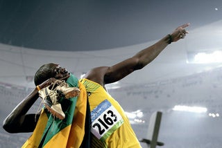 Mad Physicist Analyzes Effects of Usain Bolt's Olympic Showboating, Carl Lewis Thinks It's Juicy
