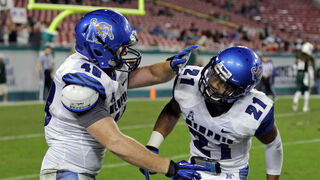 This Football Player's Just Headbutting His Teammates Without A Helmet!