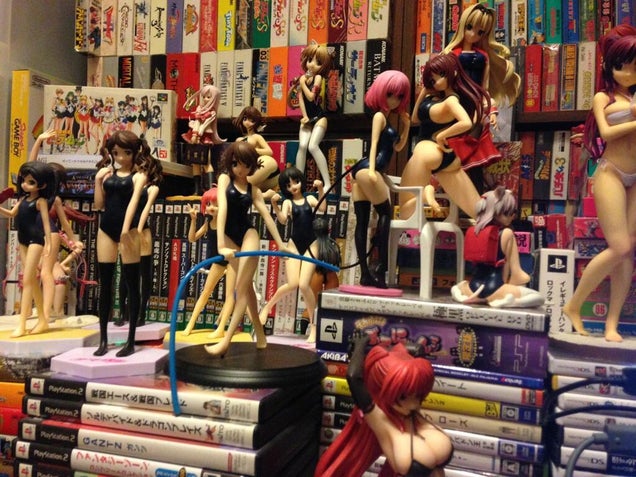 Japan's "Huge Boob Producer" Has a Desk Surrounded by Boobs
