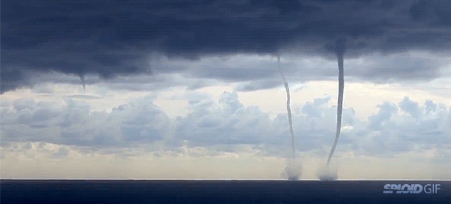 Rare footage of massive waterspouts connecting the ocean to the sky