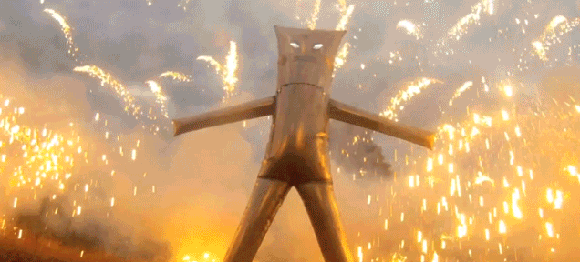Mad genius invents steel safe suit to stand inside a fireworks display