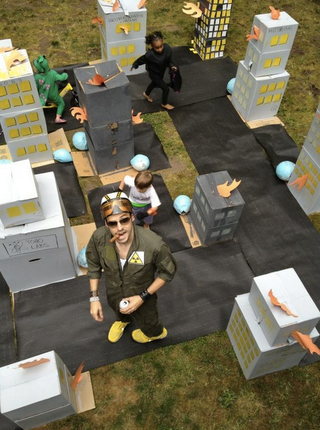 Adorable kaiju birthday party has five-year-olds smashing a cardboard city