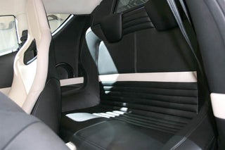Live From Paris, It's The Diminutive Back Seat Of The Lotus Evora!