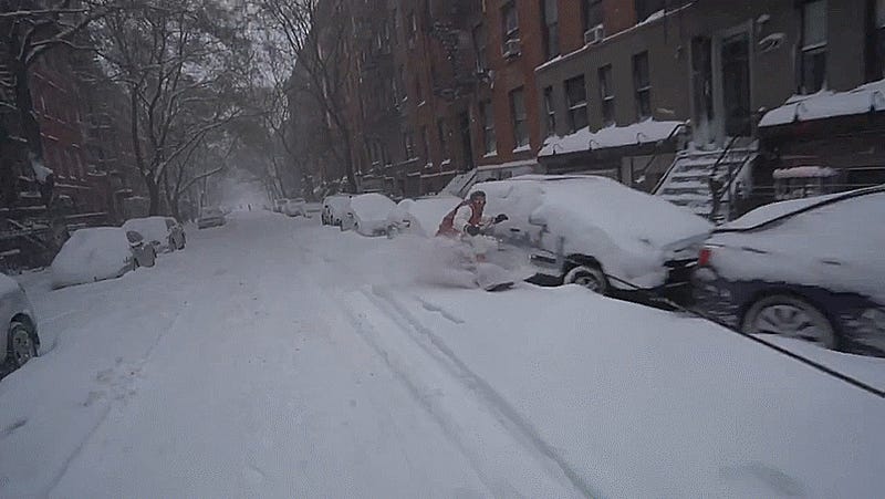 Why Be Snowed In When You Can Snowboard Through NYC Behind A Jeep Wrangler?