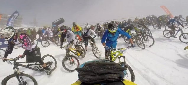 600 mountain bikers descend at once down 8,500-foot snow covered course