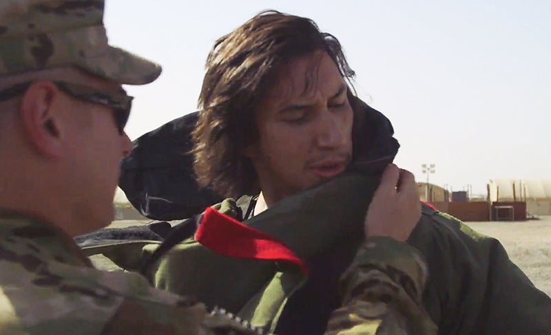 Marine Turned Star Wars Villain Adam Driver Tries On A Bomb Suit In Kuwait