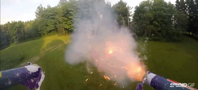 Watch a drone shoot fireworks at people from the drone's point of view