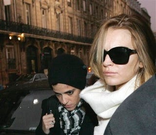 Lindsay Lohan Is Showered In Flour By An Anti-Fur Activist In Paris