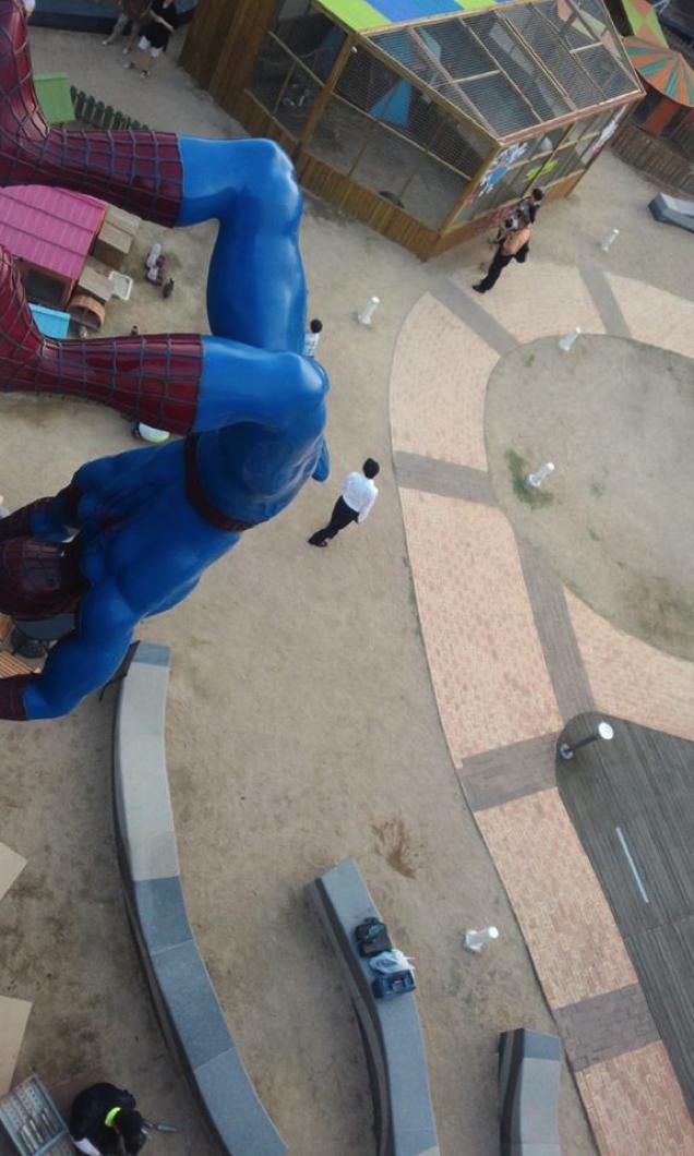 Spiderman erected over children's playground