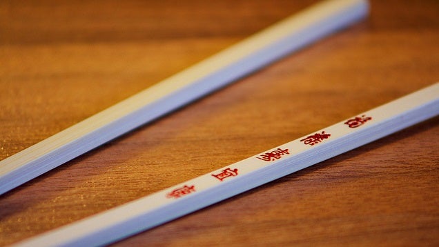 Use Wooden Chopsticks for More Control When Frying Food