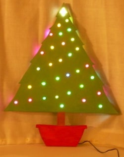 ... create a wooden Christmas tree adorned with cool, color-changing LEDs