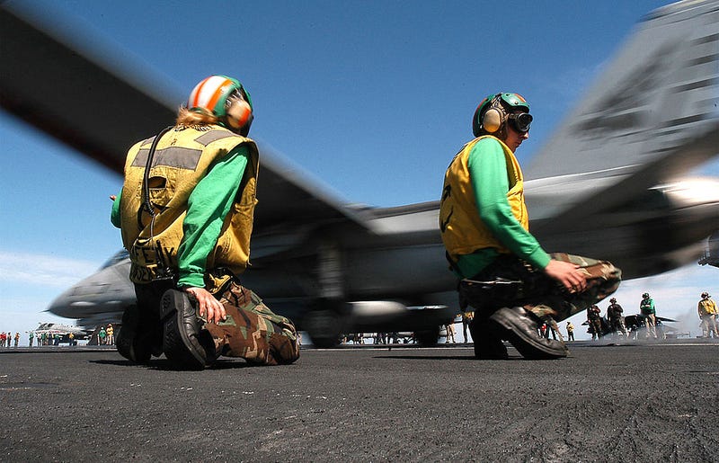 Here Is What All Those Colored Shirts Mean On An Aircraft Carrier's Deck