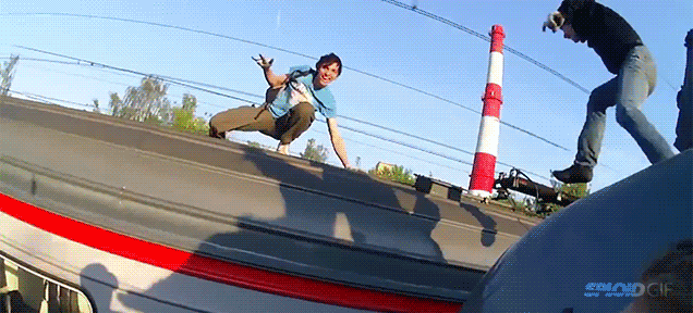 Terrifying video of insane Russian kids jumping between electric trains