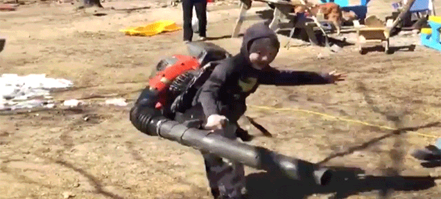Kid Wearing a Leaf Blower Hilariously Loses Control and Starts Spinning in Circles