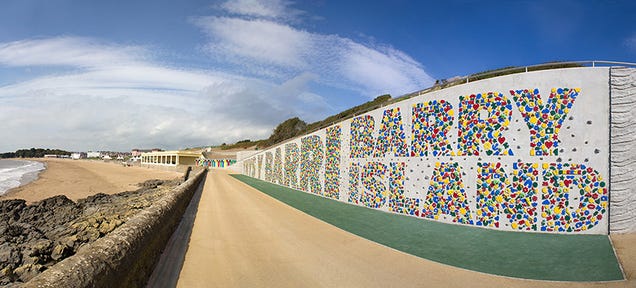 This Typographic Climbing Wall Stretches the Length of a Beach