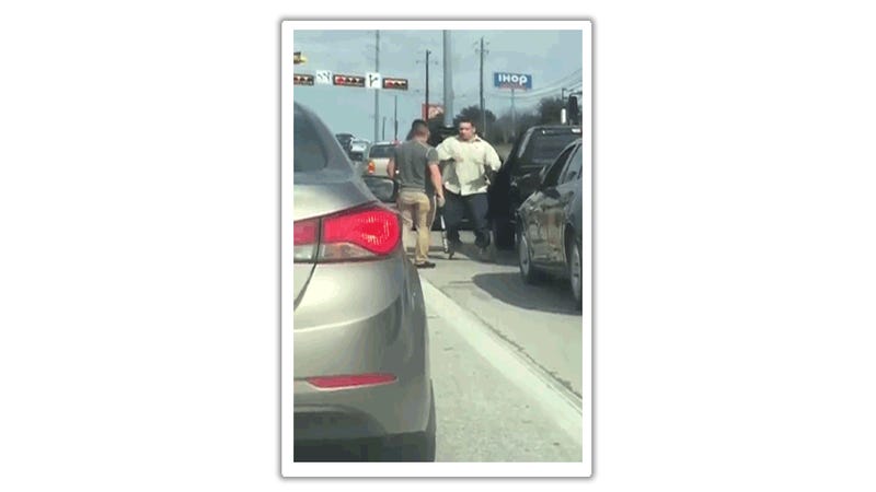 Two Men Have Epic Bat-Stick Fight At Intersection