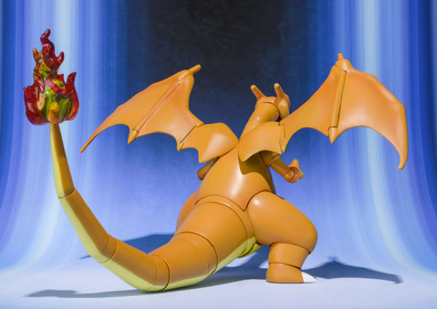 To Train This Charizard Action Figure, You Don't Need Badges. You Need Money.
