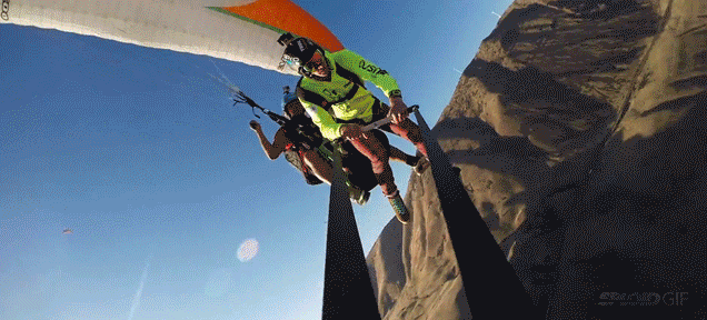 Paraglide rope swinging looks as insanely crazy as it sounds