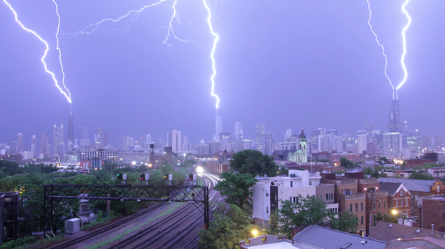 Photographer Craig Shimala was filming a time-lapse of a derecho over Chicago on the night of June 30th when a triple lightning strike touched down on three of the city's tallest buildings: Willis Tower, Trump Tower, and the John Hancock Building.
