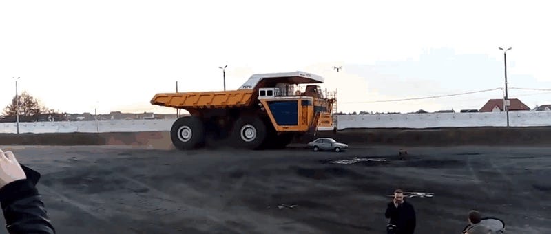 Watch A 450-Ton Dump Truck Absolutely Pancake A Car