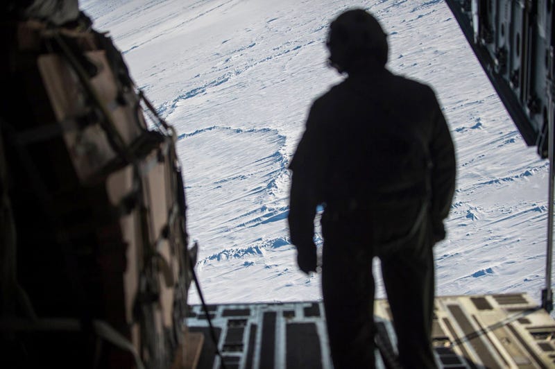 Check Out These Shots Of A C-17 Dropping Pararescuemen Over The Navy's Arctic Outpost 