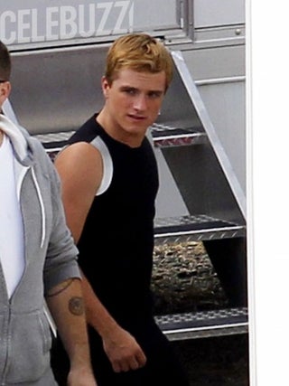 First set pics from Catching Fire show new the Hunger Games training outfits... and Finnick!